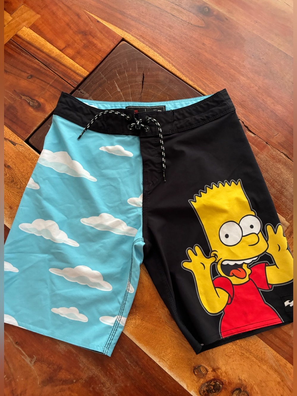 Billabong size 24" Cloud & Bart Simpson boardshorts